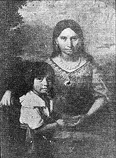 an old photo of a woman holding a child in her lap with the caption's name on it