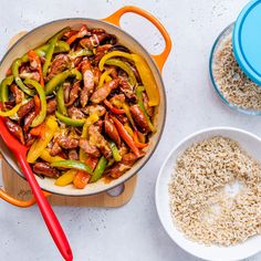 a skillet filled with meat and vegetables next to two bowls full of brown rice