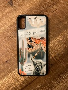 a phone case with an image of a long horn steer on the front and back