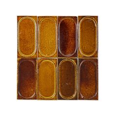 an orange and brown mosaic tile pattern on a white background