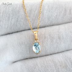 Description Elevate your style with the Natural Aquamarine 0.75 Ct Gemstone and Halfway Diamond Pendant. Crafted in 14k real gold, this unique pendant showcases the serene beauty of aquamarine paired with sparkling diamonds. Perfect for March birthstone jewelry lovers or as an elegant gift. Shine with timeless sophistication and modern elegance! The gold chain shown in pictures is just for reference and display purpose, in order pendant comes with a COMPLIMENTARY 925 SILVER CHAIN. Product Detail March Birthstone Jewelry, Pendant Diamond, Wedding Pendant, Aquamarine Pendant, Aquamarine Necklace, Art Deco Pendant, Jewelry Minimalist, Emotional Body, Water Element