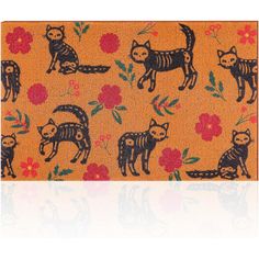 an orange door mat with cats and flowers on it