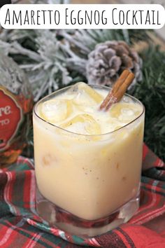 an eggnog cocktail is garnished with cinnamon