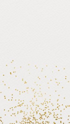 gold confetti on white background with space for text