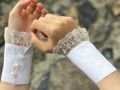 "● A pretty easy way to change the style of an outfit. Slip them over your wrists to turn your outfit from simple to elegant. ● Custom orders are welcome! ● Material: Cotton polyester blend fabric, lace, Button, Elastic. ● Measurements: Approximate sleeve extender circumference height is 13 cm/5.1 inches. ● Length: Choose your cuff circumference from the drop-down menu at checkout. ▣ Small Size: For wrists until 16cm /6.2\" circumference. ▣ Medium Size: For wrists until 18cm /7\" circumference. Elegant Formal Cuff Bracelet For Spring, White Formal Cuff Bracelet, Formal White Cuff Bracelet, Elegant White Cuff Bracelet, Elegant Spring Wedding Cuff Bracelet, Classic White Cuff Bracelet For Wedding, Lace Cuffs, Wrap Belt, Lace Button