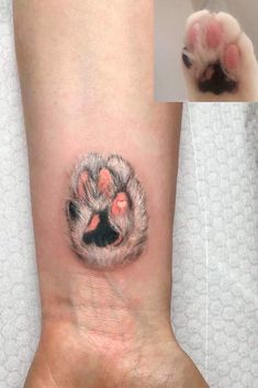 a cat paw tattoo on the left ankle and right foot, with an animal's paw