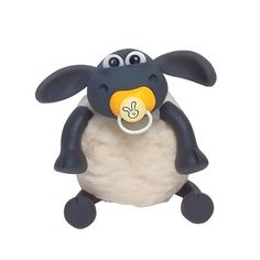 a black and white sheep with a pacifier in it's mouth on a white background