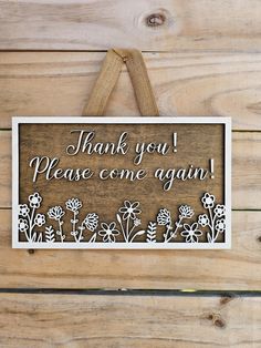 a wooden sign that says thank you please come again on the side of a wall