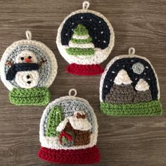 four crocheted snow globe ornament ornaments