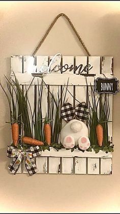 a sign that says welcome to the bunny and carrots