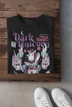 This T-Shirt was designed by Eldritch Curiosities, exclusively for Adventurers and RPG Enthusiasts! Show up to your next role-playing game session in style, wearing the latest in DnD fashion.   All our garments are made to order, using the softest, most premium quality fabrics on the market; with strong seams that hold their shape making it long-lasting. Printed using only high quality inks, resulting in vibrant colors, even after countless washes! Guaranteed to become your favorite! Produced and shipped with the help of our Printing Partners in the USA. We and they are part of an artisan community, responsible for creating thousands of jobs and we thank you for supporting our small business! <3 Oh did we mention we offer FREE SHIPPING WORLDWIDE?! You're Welcome! Favorite our listing and s Dnd Fashion, Dark Unicorn, Geek Gifts For Him, Unicorn Tshirt, Role Playing Game, Geek Gifts, You're Welcome, Funny Meme, Show Up