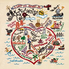 an embroidered heart with many different words and symbols in the shape of a large heart