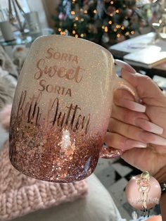 someone holding up a wine glass with the words santa sweet soria written on it