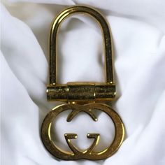 Authentic Vintage 1980s Gucci Bag Charm / Keychain Measures 2.75” H 1.25” W Gold Plated Signed Heavy And Very Well Made. Welcome To Myezvintage! Thank You For Stopping By! Enjoy Looking And Let Us Know If You Need Help With Anything! Pics Are Part Of Our Description. Please View The Entire Listing Carefully As We Don't Offer Returns. If You Have Any Questions, Please Ask Us Before Purchasing. We're Happy To Answer You. We Videotape All Items Being Packaged And May Affix A Tamper-Proof Tag To Cut Gucci Key Rung, Key Ring Gucci, Charm Keychain, Gucci Accessories, Vintage Accessories, Key Ring, Key Rings, Gucci Bag, Women's Accessories