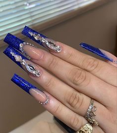 Royal Blue Acrylic Nails Christmas, Dark Blue And Silver Nails Acrylic, Royal Blue And Silver Makeup, Sapphire Nails Acrylic, Royal Blue And Silver Nail Designs, Navy Blue Quince Nails, Royal Blue Bling Nails, Blue And Silver Nails Acrylic, Royal Blue And Gold Nails For Quince