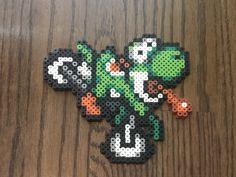 a piece of art made out of perler beads