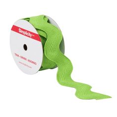 a roll of neon green ribbon on a white background