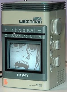 an old television with a face drawn on it's screen and the words watchman