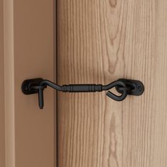 an open door with a black handle on it