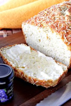 a loaf of bread sitting on top of a cutting board