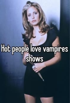 a woman standing in front of a wall with the words hot people love vampire shows