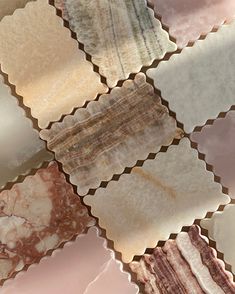 marble tiles with different colors and patterns on them