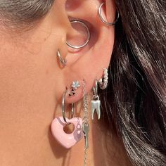 Pink Hearts Hoops! 💗

Hoops are 100% STAINLESS STEEL! Hoops are 1.2mm ( 16 gauge )! Hoops are 16mm!
Charms are Silver Tone!

Won’t rust, tarnish or turn your ears green!

✨✨ PLEASE MESSAGE ME YOUR DESIRED COLOR IN BEFORE CHECKING OUT.✨✨✨

Colors Available are Red, Blue, Dark Green, Black and Silver!🖤

꘎♡━━━━━━━━━━━━━━━━━━━━━━━━━━♡꘎

☁️ Please Use the Shopping Cart to Bundle Items ~ Msg Me With Any ?’s on Ordering ~ Items Shipped Every Tues & Fri! ☁️

꘎♡━━━━━━━━━━━━━━━━━━━━━━━━━━♡꘎ Cute Earring Stacks, Earring Stacks Silver, Silver Earring Stack, Earring Aesthetic, Curated Ears, Ear Curation, Pretty Ear Piercings, Cute Ear Piercings, Piercing Inspo