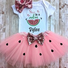 one in a melon watermelon shirt and pink tutu skirt with sequins