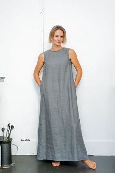 Washed linen dress. Minimalist midi kaftan. Casual sleeveless summer dress. Sustainable dress with pocket. Natural flowy dress AMELIA. This grey maxi dress made in high quality washed Baltic linen fabric which is a piece that could be worn by anybody. The dress has pockets sewn into the side seams, which are very practical. The dress is closed with linen ribbon on the back. Linen will warm you when cold and will not let you get overheated, it is very body-friendly. Height of model - 178 cm / siz Basic Linen Dress, Sustainable Dress, Dress Minimalist, Sleeveless Summer Dress, Linen Ribbon, Grey Maxi, Long Linen Dress, Linen Fashion, Grey Maxi Dress