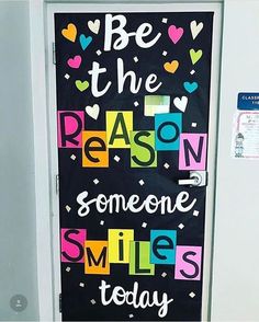 a door decorated with the words be the reason someone smiles today