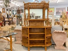 an antique display in a store filled with furniture