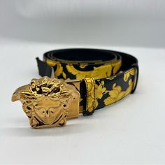 Signature Versace Baroque Print Details The Face Of This Reversible Leather Belt With Goldtone Medusa Buckle. Baroque Print Reverses To Black Leather Goldtone Hardware Made In Italy Size Width, 1.5" Designer Leather Party Belts, Designer Leather Belts For Party, Designer Gold Belt, Designer Gold Belt For Party, Designer Party Belts, Luxury Belts With Gold Buckle, Versace Belt Men, Designer Black Belt With Gold Buckle, Formal Black Belt Buckles With Gold-tone Logo