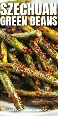 green beans on a white plate with seasoning