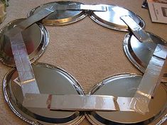 a circular metal object sitting on top of a carpet