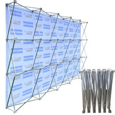 an image of a large display with metal poles in front of it and the backdrop behind it