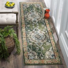 a living room filled with furniture and rugs