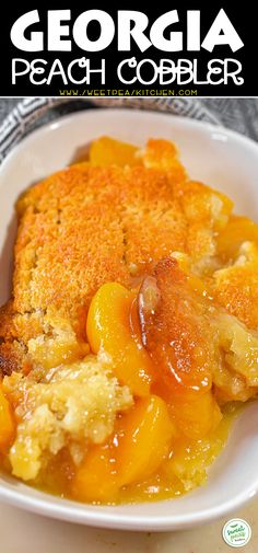 a white bowl filled with peach cobbler on top of a table