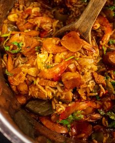 a large pot filled with rice and meat