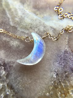 These beautiful dainty necklaces feature high quality Crescent moon rainbow moonstone pendents that I have wire wrapped and placed on a coordinating chain. You can choose the length from the drop down menu.  These necklaces provide that Goddess energy that you are looking for helping you to connect to the magic of the moon. 🌚 Intensifies Goddess Energy🌚 Enhances feelings and encourages desires 🌚 Recognize and embrace personal power   🌚 These crystals reflect within them the magical healing q Moon Jewelry Necklace, Crystal Moon Necklace, Moonstone Necklace Pendants, Moonstone Aesthetic, Moonstone Jewelry Necklace, Moon Stone Crystal, Moon Stone Necklace, Moon Crystal Necklace, Crystal Point Jewelry