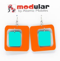 "Modern art earrings inspired by mid century modern retro design and my hanging art mobiles. Wearable art! Custom handmade by me in my studio in Los Angeles. No-worry, no-pain hypo-allergenic titanium ear wire, stainless steel rings, and adorably mod acrylic dangle shapes. Show your mid century modern style with these modern earrings! Arrives in lovely gift box with ribbon. CHOOSE FROM 2 SIZES: Medium: 2 5/8\"h x 1 3/4\" w Small: 2\"h x 1 3/8\"w TWO TONE COLORS COLLECTION Choose from: 8 fashion Modern Retro Design, Kinetic Art Sculpture, Mid Century Modern Jewelry, Mod Earrings, Palm Springs Style, Retro Earrings, Acrylic Shapes, Mod Style, Art Earrings