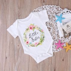 * O-Neck Bodysuits * Material: Cotton * Machine Wash, Tumble Dry * Imported * Brand: Babyball Newborn Christmas Outfit, Kids Clothes Storage, Big Sister T Shirt, Baby Clothes Storage, Matching Sisters, Bodysuit Shirt, Trendy Boy Outfits, Baby Boy Clothes Newborn, Sister Tshirts