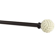 a black handle with a white ball on it's end and an iron rod