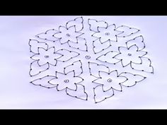 a snowflake is shown in the shape of a flower with four petals on it