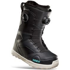 the snowboard boots are black and green