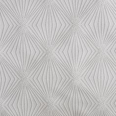 an upholstered wallpaper pattern in grey and white with wavy lines on it