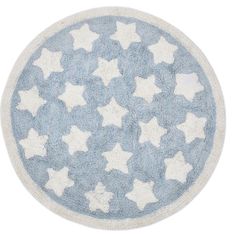 a blue and white rug with stars on it