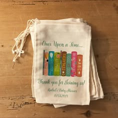 a small drawstring bag with some books on it