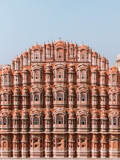 an ornate building with many windows and balconies