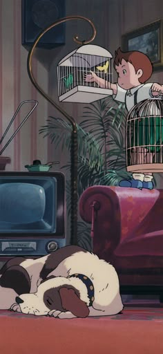 a dog laying on the floor in front of a television with a man holding a bird cage