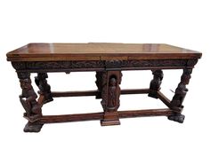 "Elizabethan era table that seems to have been pereviously auctioned at Christie's Auction House. Two CAH stickers are still present on this refectory/draw leaf table. It is made of walnut wood, with removable statues on supports. The most meaningful of the features in this table are the lions statues supports, that hold seals with depictions of the coat of arms of Queen Elizabeth I, in use 1558-1603.  As per CAH records found, this table matches the description included in a picture here. Table seems to have been auctioned in 1991, 22 years ago, per CAH records. Provenance is United Kingdom then somehow landed in Texas . Dimensions are 70\" L x 30\" H x 30\" DAt this price, do your own due diligence before purchasing. More pictures are available upon request, as there's a limit on picture Church Table, Draw Leaf Table, Christies Auction House, Draw Leaf, Elizabethan Era, Refectory Table, Leaf Drawing, Elizabeth I, Leaf Table